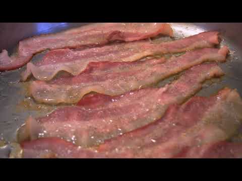 Close Up Of Bacon Frying