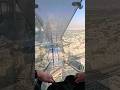 Scariest glass slide, over 200 metres off the ground! Sky Views Observatory Dubai #travel #scary
