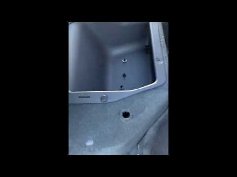 Removing under seat storage tray in a Ford Ranger