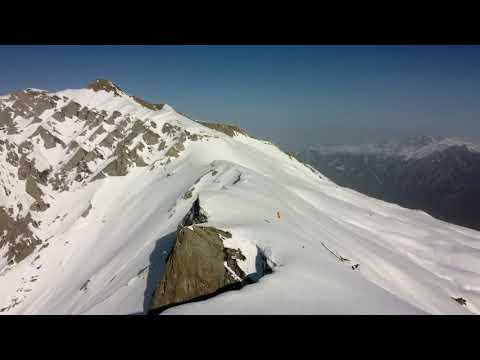 Snowkiting at the edge in the Swiss mountains at Calanda