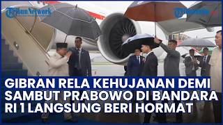 Momen Gibran Rela Hujan-hujanan Jemput Kepulangan Presiden Prabowo di Bandara Halim