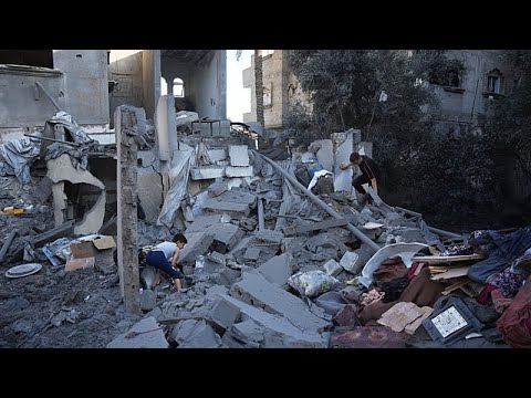 Video Thumbnail: Gaza Families search ruins after Israeli strikes hit homes