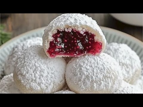 Delightful Raspberry Filled Almond Snowball Cookies