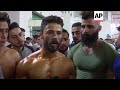 Palestinians flex their muscles in rare competition