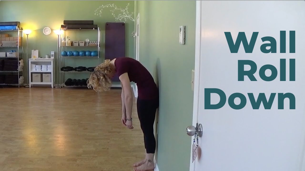 Wall Roll DownâŽ®Standing Pilates Exercise - YouTube