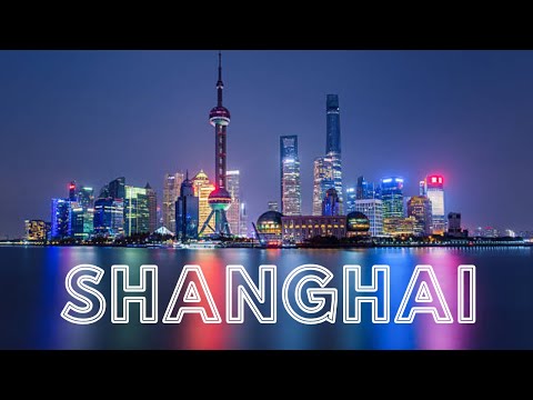 SHANGHAI RIVER WITH ILLUMINATED CITY BUILDINGS ~ HD FOOTAGE