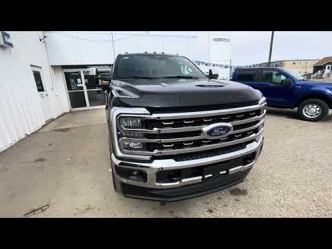 2026 Ford Super Duty F-350 SRW King Ranch 4WD Crew Cab 6.75' Box in Black for sale at HomeField Ford in Raymond, AB