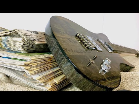 You Need 700 Sheets of Newspaper to Build a Guitar