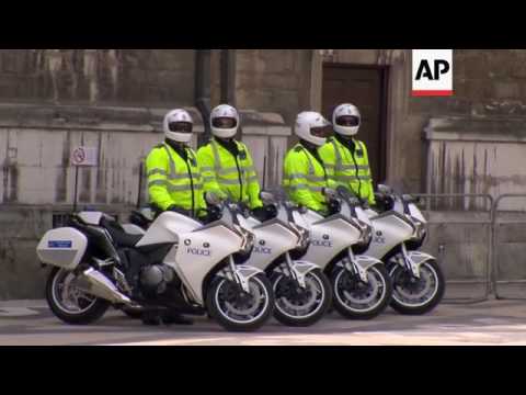 Members of the British royal family arrive for lunch at London's Guildhall