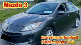 Mazda 3, B2774 & B2778 curtain airbag open circuit