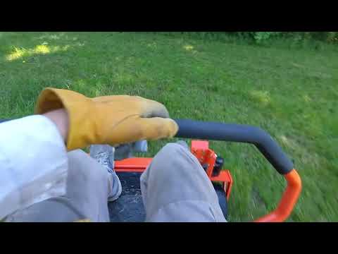 2021 Bad Boy Maverick mowing grass