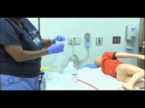 Administration of High-Volume Enema Using a Red Rubber Catheter | Children