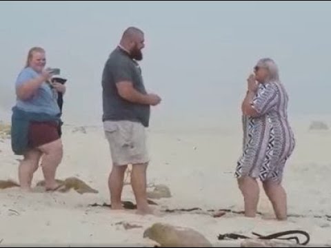 Fat women keeps falling during a proposal
