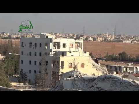 استهداف نقاط قوات النظام بمدفع جهنم من قبل حركة نور الدين الزنكي على المباني المحيطة بالبحوث العلمية في حي الراشدين محافظة حلب