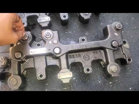 inside a cummins engine installing jake brakes