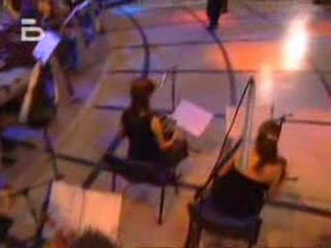  Gabriel Missé  and  Alejandra Mantinan  are  dancing  to  the  tango  "  Lo Que Vendra  "