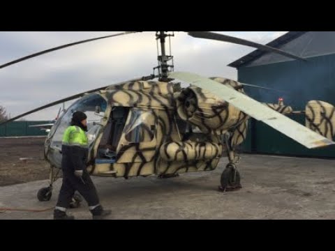 Helicopter Kamov KA-26 starts the engines