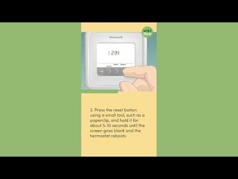 Part of a video titled How To Reset Honeywell Thermostat - YouTube