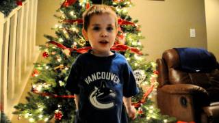 "When Santa Got Stuck Up the Chimney" sung by Simon