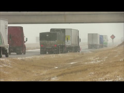 Stranded travelers wait out blizzard closure of I-70 from Airpark Road to Kansas