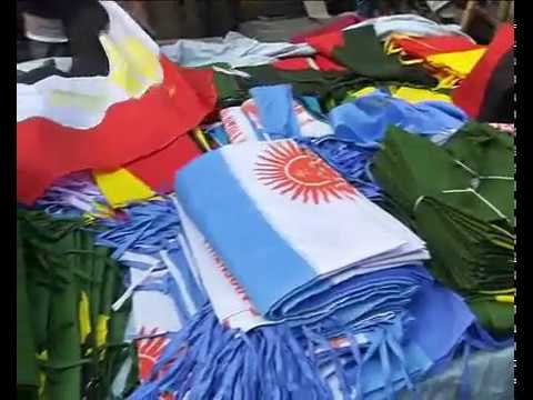বিভিন্ন দেশের পতাকা ও জার্সি তৈরিতে ব্যস্ত কারিগররা