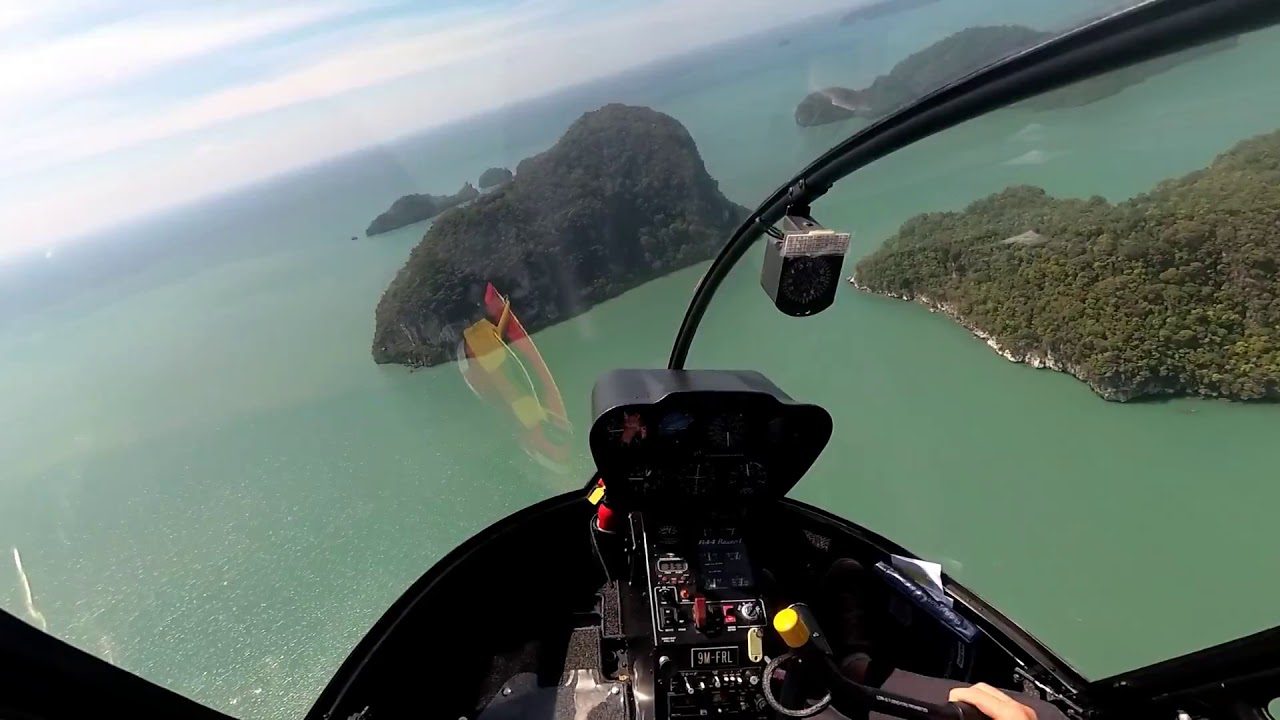 Experience the breathtaking bird's eye view from a helicopter soaring above Langkawi.