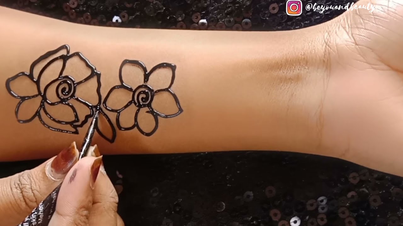 black and red shaded floral mehndi design by be you and beauty