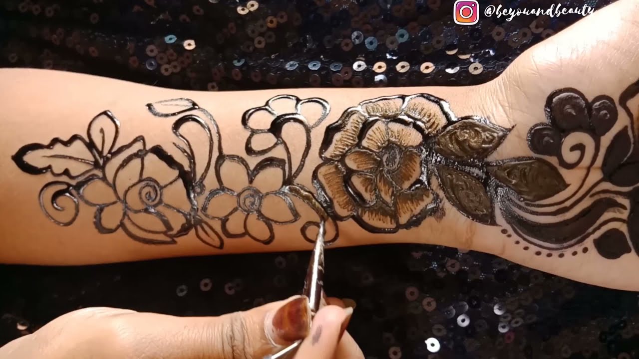 black and red shaded floral mehndi design by be you and beauty