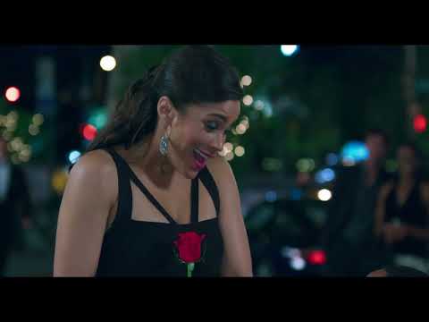 Close-up of mother–of-the-bride and mother–of-the-groom during a tense exchange underscored by strings