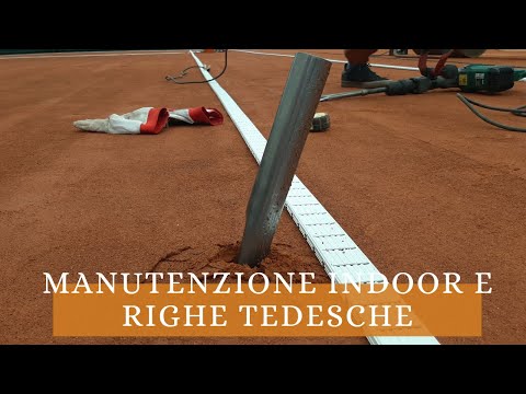 Clay court heavy maintenance and new german lines.  Manutenzione indoor e nuove righe tedesche