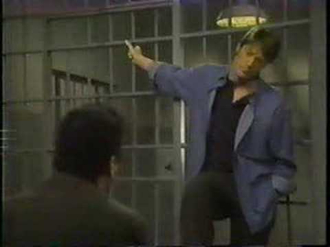 sonny has a claustrophobis attack in a jail cell