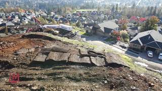 Drilling and blasting for utilities within mere feet of existing residences