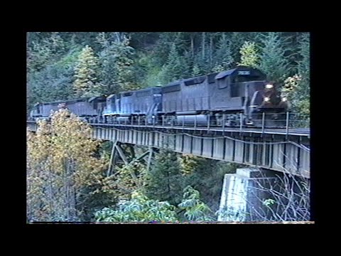 1189. SOUTHERN PACIFIC SP 7636 HELPER set with EMD GP 60 DEMONSTRAITER at Tunnel 7 8 Oregon in 1993