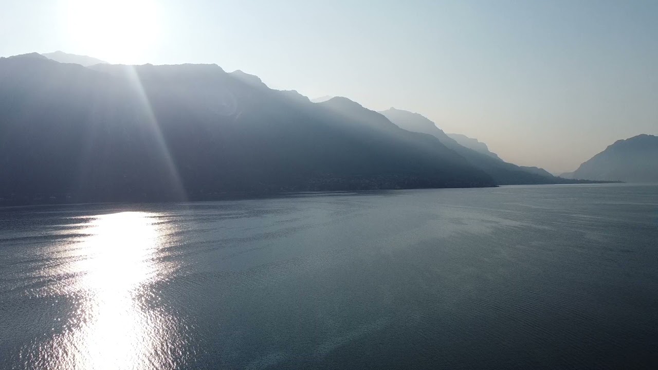 Discover peaceful lake reflections at Borgo di Pescallo.
