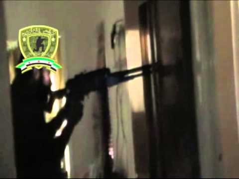 اشتباكات خلال اقتحام لواء الفجر أحد الأبنية التي تتمركز بها قوات النظام في مدينة داريا في ريف دمشق