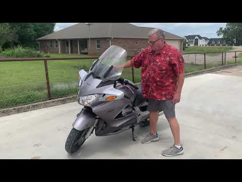 2003 Silver Honda ST1300 ST1300 (JH2SC51103M) with an 1261CC engine, 5 SPEED transmission, located at 17760 HWY 62, MORRIS, 74445, 35.609104, -95.877060 - 2003 HONDA ST1300 1261CC 5-SPEED TRANSMISSION WITH AN ELECTRIC START, POWER-ADJUSTABLE LIGHTS, POWER-ADJUSTABLE WINDSHIELD, NICE CLEAN TOURING SPORTS BIKE. ONLY 17,093 MILES, MARATHON TIRES, IT HAS REBUILT TITLE DUE TO A SMALL ACCIDENT. LIGHT SCRAPES AS SHOWN IN PICTURES. WE OFFER A FREE CARFAX ON - Photo#0