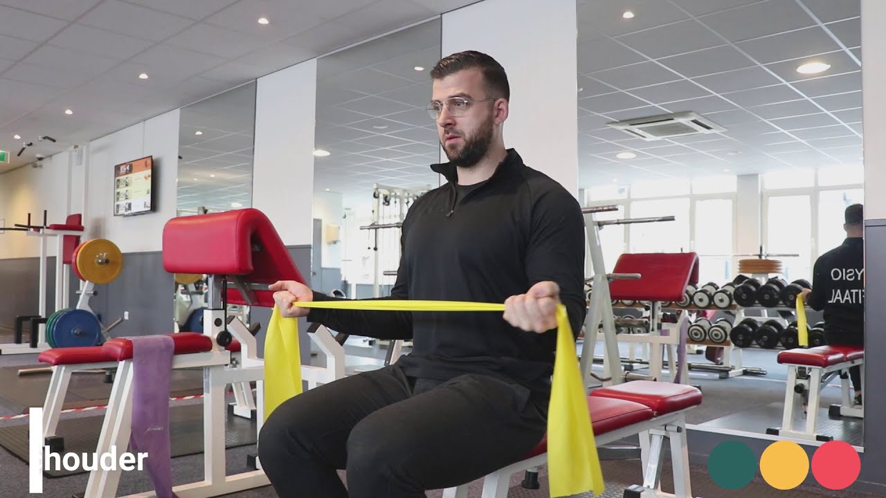 Video thumbnail: Exorotatie schouder in zit dynaband — instructievideo