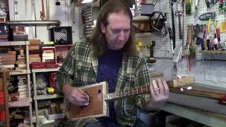What's the Difference Between a 3 String and 4 String Cigar Box Guitar?