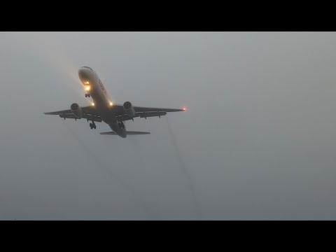 Breaking out at Minimums! FedEx 1767 ILS 15 approach at Burlington International Airport