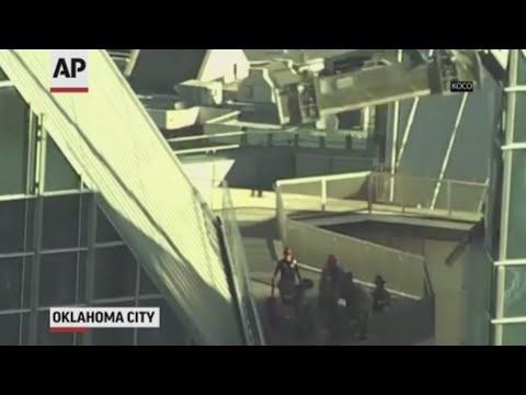 Two window washers are rescued from a scaffold above the roof of an Oklahoma City skyscraper. (May 15)