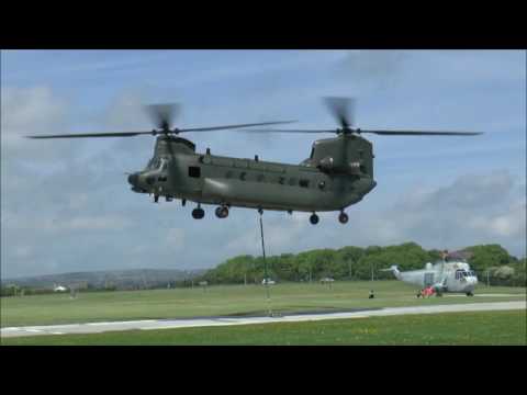 RAF Chinook Lifting Royal Navy Sea King Helicopter at RNAS Culdrose