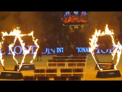 Mounted Police Jumping Through Fire