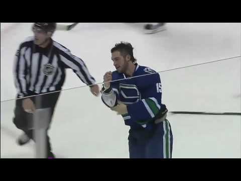 Luke Schenn vs Tanner Glass Oct 24, 2009