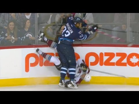 Byfuglien flattens Barrie with monster check