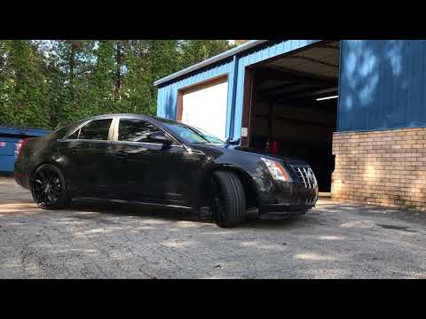 2011 Cadillac cts sitting on black 22\" lexani pegasus wheels wrapped in 235/30-22 Lexani tires