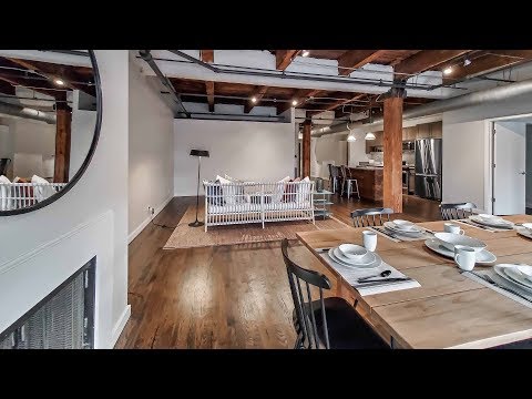A West Loop 2-bedroom, 2-bath model at The Lofts at Gin Alley A West Loop 2-bedroom, 2-bath model at The Lofts at Gin Alley