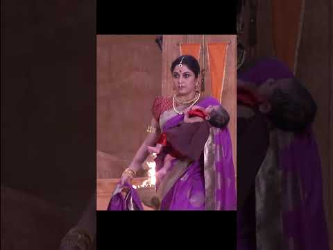 The Sivagami Way!One moment, a gentle mother soothing a baby. #BaahubaliTheEpic