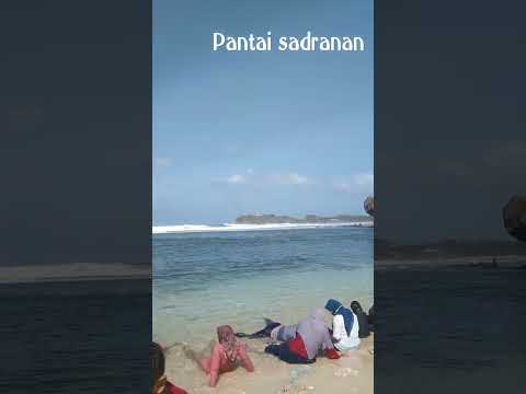 Sadranan, pantai cantik di Gunung Kidul yang wajib dikunjungi! Siapkan diri untuk sunset yang memukau dan air yang jerni...