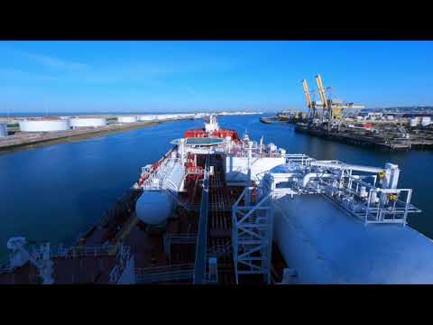HUGE SHIP LEAVING NARROW PORT!