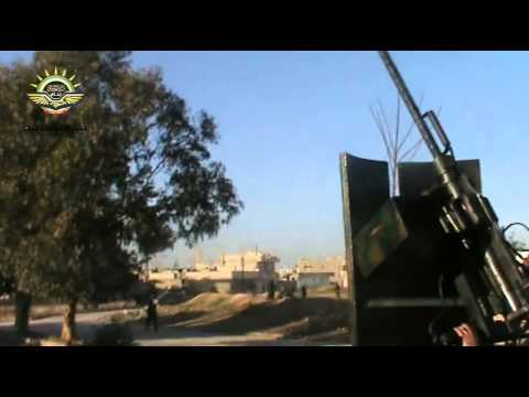 التصدي للطيران الحربي برشاش الدوشكا من قبل تجمع ألوية أبناء حماة في بلدة صوران في ريف حماة